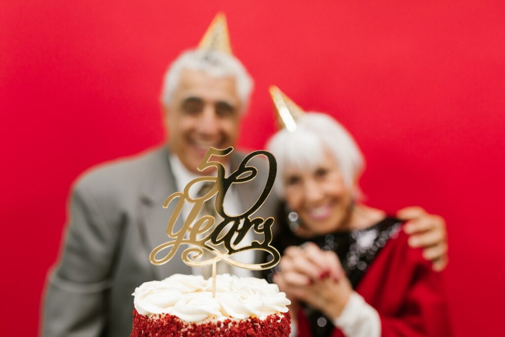 Man and Woman in Front of Cake